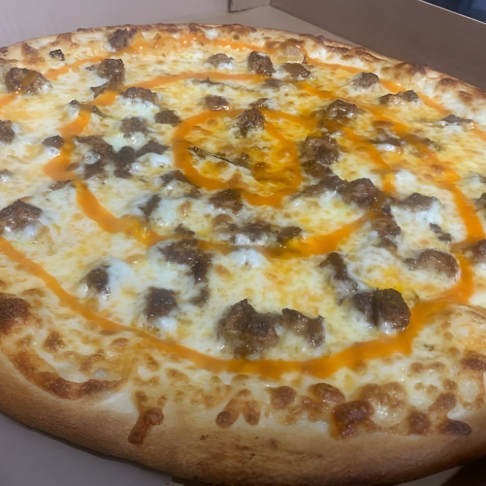 Gino's Pizza and Grill's pizza with melted cheese, sausage, and a swirl of orange sauce.